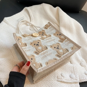 Linen mini tote bag featuring teddy bear prints and rope handles for casual style