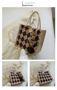 Detail of linen tote bag with lattice pattern, wooden button, and rabbit pendant