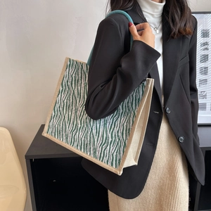Green and beige zebra print canvas tote bag with contrast rope handles for women