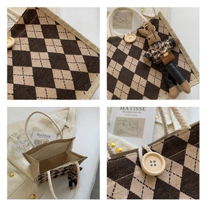 Detailed view of argyle linen tote bag featuring wooden button and rabbit doll charm