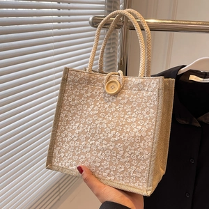 Chic beige linen tote bag with 3D floral embroidery and woven handles for women