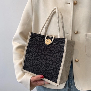 Floral print tote lunch bag with rope handles and wooden button for daily use