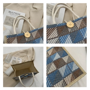Detail view of woven plaid tote with vintage wooden button and sturdy rope handle