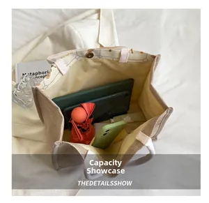 Top-down view of spacious tote bag showing interior storage for tablet and umbrella