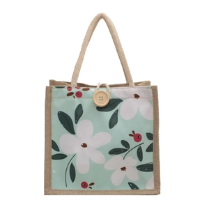 Sac fourre-tout en toile à fleurs avec bordure en jute et fermeture à bouton en bois