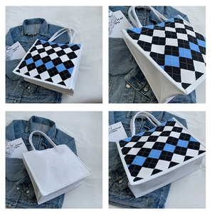 Detail views of argyle pattern canvas tote bag with sturdy straps from multiple angles