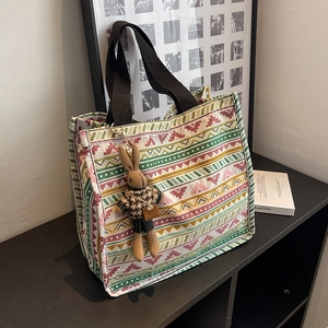 Ethnic style canvas tote bag with geometric patterns and a cute bunny charm for daily use