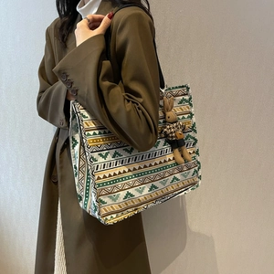 Ethnic style large canvas tote bag with geometric print and plush rabbit pendant
