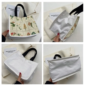 Detailed views of floral canvas tote bag with black handles and vintage botanical print