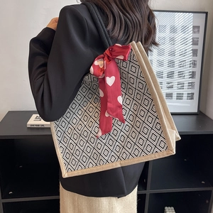 Large linen tote bag with black and white diamond pattern and red heart silk scarf