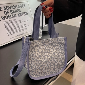 Floral lilac canvas tote bag with adjustable shoulder strap for women, stylish crossbody design