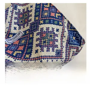 Detailed close-up of colorful ethnic woven fabric and fashion instinct brand label