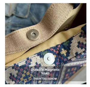 Close-up of sturdy magnetic snap closure on ethnic jacquard fabric tote bag
