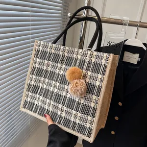 Large capacity black and white checkered tote bag with plush pom-pom charm and woven handles