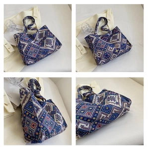 Detailed close-up of ethnic style woven tote bag featuring geometric jacquard patterns