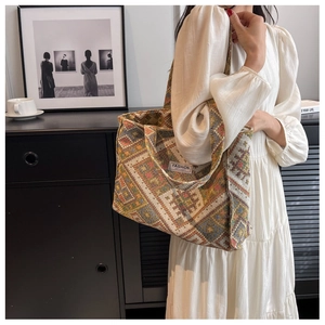 Detail of large ethnic tote bag with geometric pattern and Fashion Instinct label