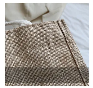 Close-up of durable jute tote bag with neat stitching and thick white cotton rope handles