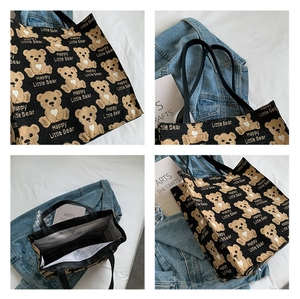 Detail shots of black canvas tote bag featuring repeated bear prints and spacious interior