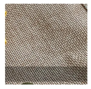 Close-up of the natural linen fabric texture with premium plain weave and embroidery