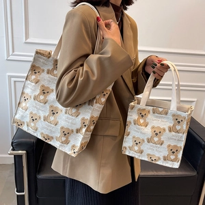 Canvas tote bag set with cute cartoon bear pattern and comfortable leather handles