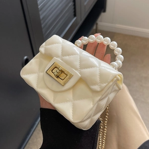 Mini white quilted jelly handbag for girls with pearl handle and golden chain strap