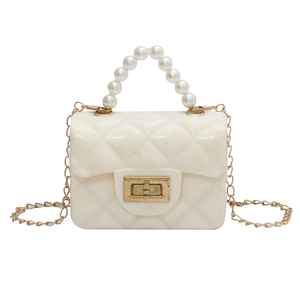 Mini white jelly crossbody bag with quilted pattern, pearl handle and gold chain strap