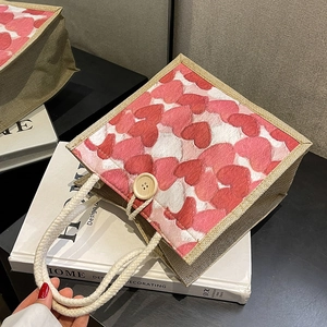 Linen bento tote bag with red heart prints and wooden button closure for women