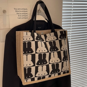 Minimalist canvas tote bag with black and white checkerboard miffy pattern design