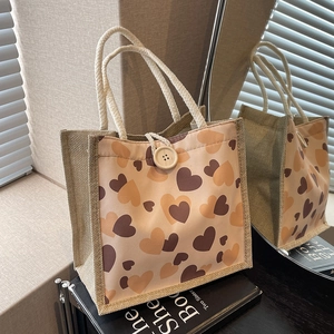 Japanese style lunch bag with heart print patterns and sturdy cotton rope handles