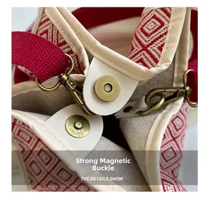 Detail of vintage brass magnetic clasp and woven pattern on stylish bucket bag