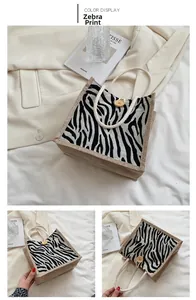 Close-up of zebra pattern linen tote bag featuring wooden button and rope handle texture