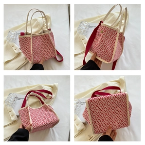 Detailed views of geometric diamond pattern handbag with red and white woven texture
