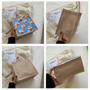 Detail views of linen tote bag with cartoon tiger print and woven handles