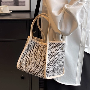 Fashionable black and white checkered woven tote bag with detachable wide shoulder strap