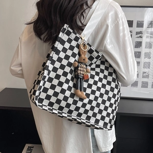 Fashionable checkerboard canvas tote bag for women with a cute plush rabbit pendant charm