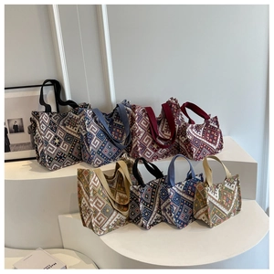 Detailed view of bohemian canvas tote bags in various sizes with geometric ethnic patterns