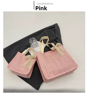 Pink checkered canvas tote bags with elegant white lace bows and soft fabric handles