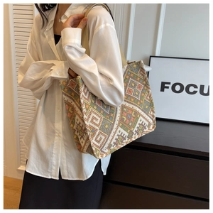 Ethnic style jacquard tote bag featuring colorful geometric patterns and wide shoulder strap