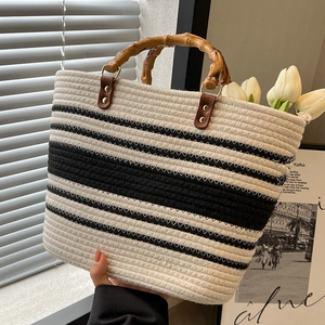 Striped straw tote bag with bamboo handles and large capacity for summer beach holidays
