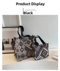 Detail view of ethnic geometric canvas tote bags in various sizes with black handles