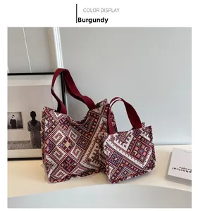 Detail of wine red canvas tote bag set with ethnic geometric woven jacquard pattern