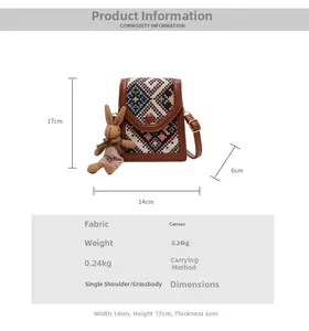 Detailed size chart for a canvas crossbody bag with geometric pattern and bunny charm