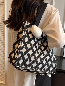 Large capacity black and white woven canvas tote bag with a white heart charm pendant