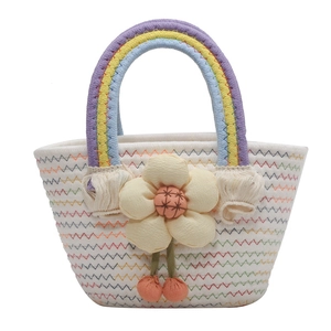 Handmade rainbow woven straw handbag with a 3D cream flower charm for women and kids