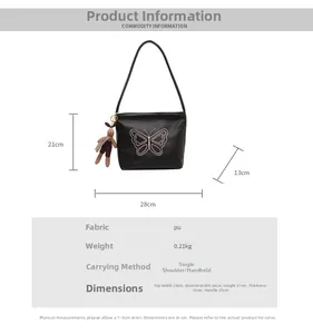 Detailed size chart of black PU tote bag with butterfly embroidery and rabbit pendant