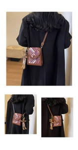 Retro ethnic woven flap crossbody bag featuring a cute plush bunny pendant detail