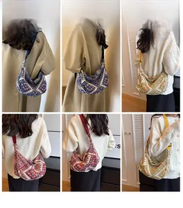 Multiple views of large ethnic canvas crossbody bag with geometric patterns and wide strap