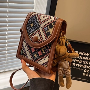 Retro geometric crossbody bag with brown leather trim and cute rabbit pendant charm
