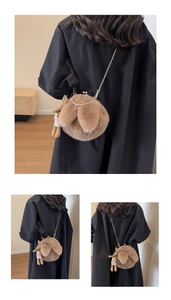 Macro detail of brown plush rabbit-shaped crossbody bag with gold chain and furry texture
