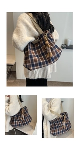 Close-up of vintage brown and blue plaid wool tote bag with a cute bunny charm